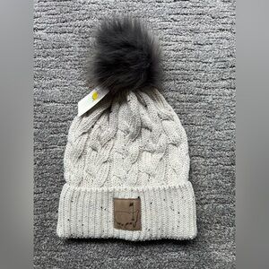 NWT beanie with Pom Pom ball from the Masters